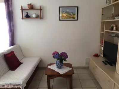 Télévision ou salle de divertissement dans l'établissement Rez de Villa Vue Mer Panoramique