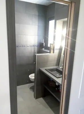 Salle de bains dans l'établissement Appartement charmant à Olmeta di Tuda avec piscine partagée