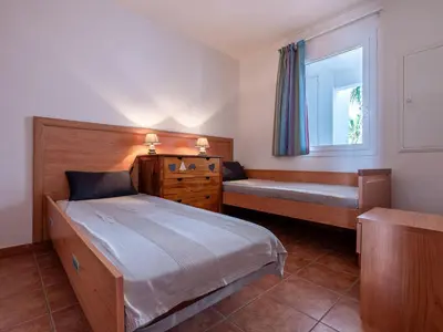 Un ou plusieurs lits dans un hébergement de l'établissement Apartment Casa Vecchi by Interhome