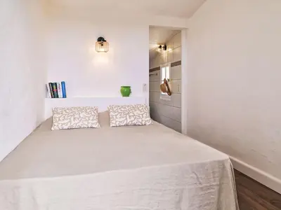 Un ou plusieurs lits dans un hébergement de l'établissement Holiday Home Maison Gerard by Interhome