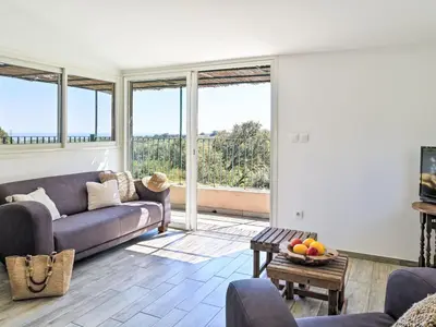 Coin salon dans l'établissement Holiday Home Maison Gerard by Interhome