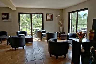 Coin salon dans l'établissement Auberge des Deux Sorru