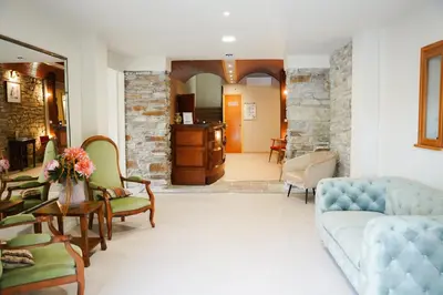 Coin salon dans l'établissement Hôtel 