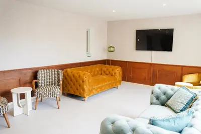 Télévision ou salle de divertissement dans l'établissement Hôtel 
