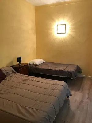 Un ou plusieurs lits dans un hébergement de l'établissement Auberge Casa Mathea