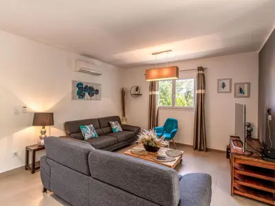 Coin salon dans l'établissement Holiday Home Villa Marie-Jo by Interhome