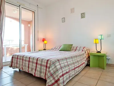 Un ou plusieurs lits dans un hébergement de l'établissement Apartment Suarella-2 by Interhome