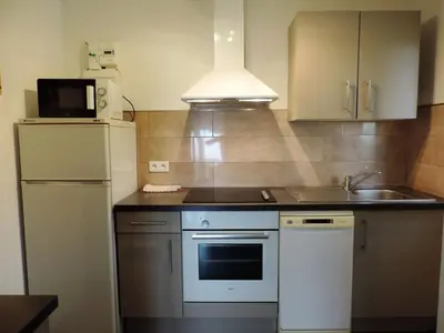 Cuisine ou kitchenette dans l'établissement Apartment Fougère by Interhome