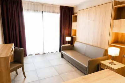 Coin salon dans l'établissement Hotel Residence Lido Marana Bastia Furiani