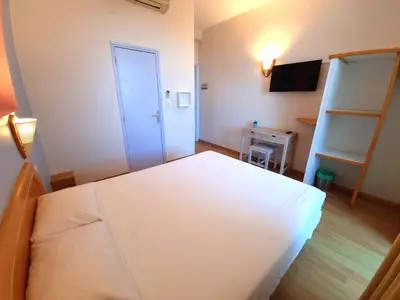 Un ou plusieurs lits dans un hébergement de l'établissement Hôtel Sole Mare