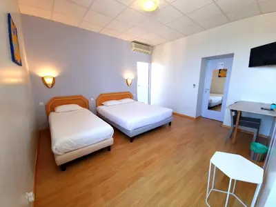 Un ou plusieurs lits dans un hébergement de l'établissement Hôtel Sole Mare