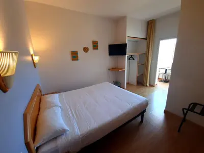 Un ou plusieurs lits dans un hébergement de l'établissement Hôtel Sole Mare