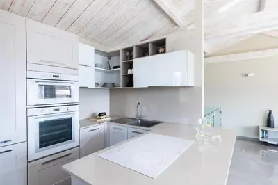 Cuisine ou kitchenette dans l'établissement Residence Pidrinella