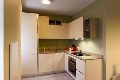 Cuisine ou kitchenette dans l'établissement Residence Pidrinella