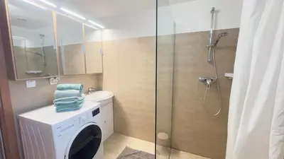 Salle de bains dans l'établissement T2 Les Aloes