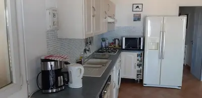 Cuisine ou kitchenette dans l'établissement Porteo - Les Terrasses du Port