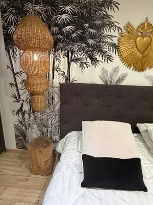 Un ou plusieurs lits dans un hébergement de l'établissement Domaine Colonna-Santini Gîte avec Piscine & Spa, Vue Mer et Montagnes