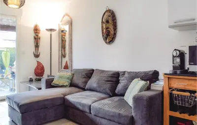Coin salon dans l'établissement 3 Bedroom Gorgeous Home In Cervione