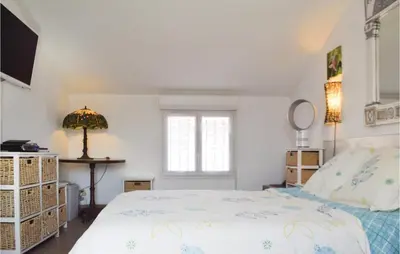 Un ou plusieurs lits dans un hébergement de l'établissement 3 Bedroom Gorgeous Home In Cervione