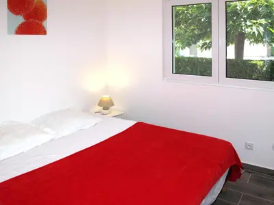 Un ou plusieurs lits dans un hébergement de l'établissement Holiday Home A Suara-1 by Interhome