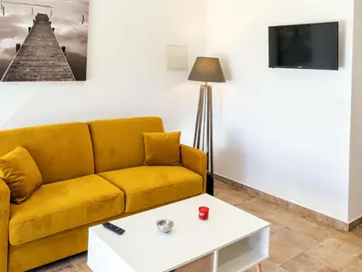 Coin salon dans l'établissement Apartment A Suara di Mare by Interhome