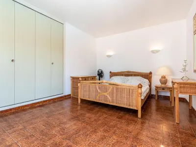 Un ou plusieurs lits dans un hébergement de l'établissement Holiday Home Casella by Interhome