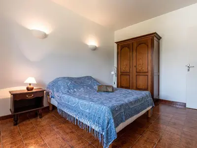 Un ou plusieurs lits dans un hébergement de l'établissement Holiday Home Casella by Interhome