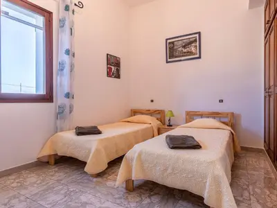 Un ou plusieurs lits dans un hébergement de l'établissement Apartment Casa Antoinette by Interhome