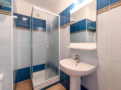 Salle de bains dans l'établissement Vacancéole - Résidence Sognu di Rena
