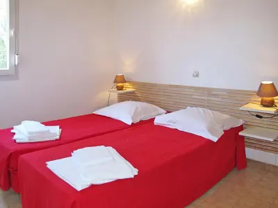 Un ou plusieurs lits dans un hébergement de l'établissement Apartment Thalassa-1 by Interhome