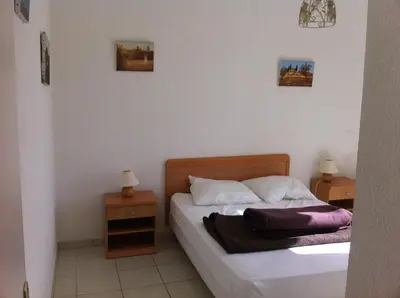 Un ou plusieurs lits dans un hébergement de l'établissement Villa Romarin