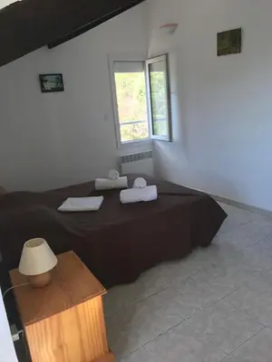 Un ou plusieurs lits dans un hébergement de l'établissement Villa Romarin