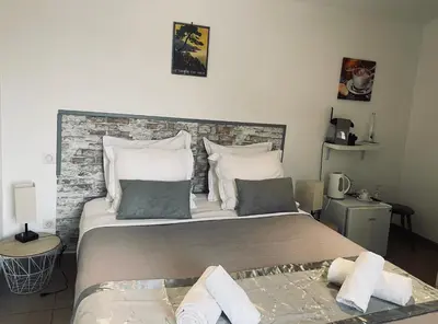 Un ou plusieurs lits dans un hébergement de l'établissement Hôtel U Passa Tempu