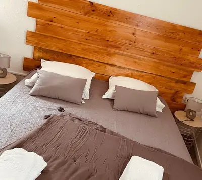 Un ou plusieurs lits dans un hébergement de l'établissement Hôtel U Passa Tempu