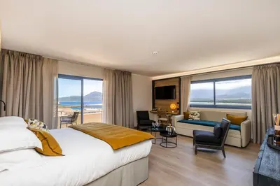 Un ou plusieurs lits dans un hébergement de l'établissement Hotel L'Acquale