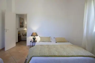 Un ou plusieurs lits dans un hébergement de l'établissement Casa Gentile