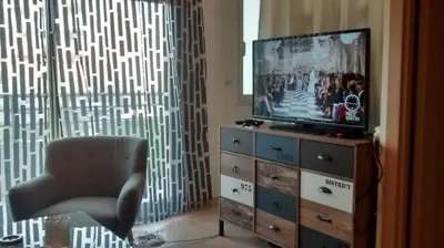 Télévision ou salle de divertissement dans l'établissement Victoria