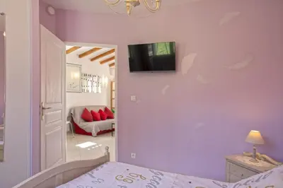 Télévision ou salle de divertissement dans l'établissement Casa Nostra
