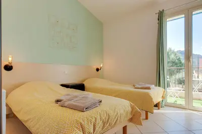Un ou plusieurs lits dans un hébergement de l'établissement Terrazza Soli Mare