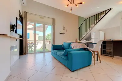 Télévision ou salle de divertissement dans l'établissement Terrazza Soli Mare