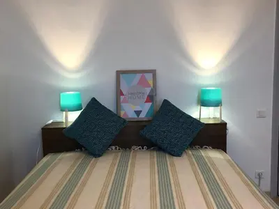 Un ou plusieurs lits dans un hébergement de l'établissement Appartement Casella
