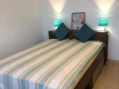 Un ou plusieurs lits dans un hébergement de l'établissement Appartement Casella