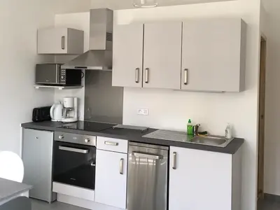 Cuisine ou kitchenette dans l'établissement APPARTEMENT ERNELLA