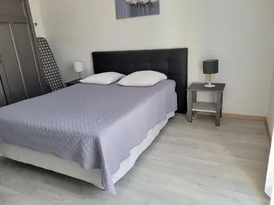 Un ou plusieurs lits dans un hébergement de l'établissement APPARTEMENT ERNELLA