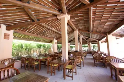 Restaurant ou autre lieu de restauration dans l'établissement Résidence Sognu Di Mare - Plage