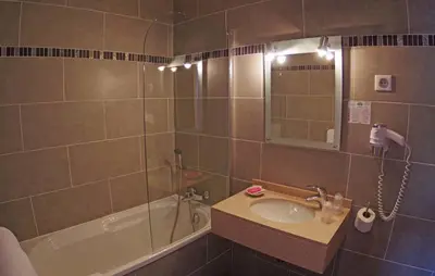 Salle de bains dans l'établissement Brise de Mer