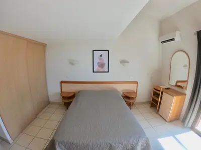 Un ou plusieurs lits dans un hébergement de l'établissement Hotel et Résidence Cala di sole