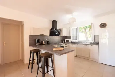 Cuisine ou kitchenette dans l'établissement Résidence Spelonca