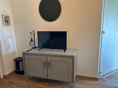 Télévision ou salle de divertissement dans l'établissement Appartement n 79 Moriani plage
