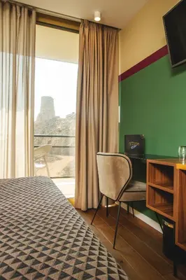 Télévision ou salle de divertissement dans l'établissement Hotel La Pietra Restaurant & Spa